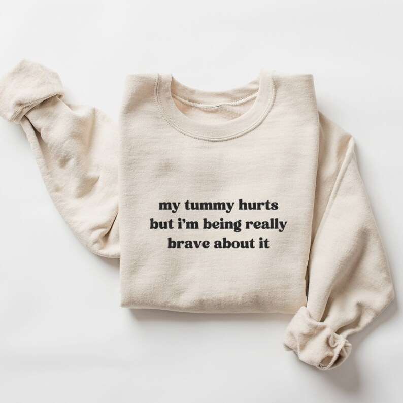My Tummy Hurts But I'm Being Really Brave About It Embroidered Sweatshirt